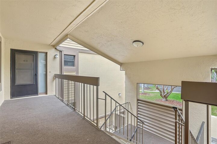 Property Photo:  130 Woodlake Wynde 130  FL 34677 