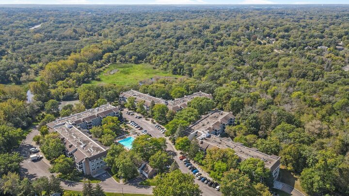 Property Photo:  3020 Saint Albans Mill Road 105  MN 55305 