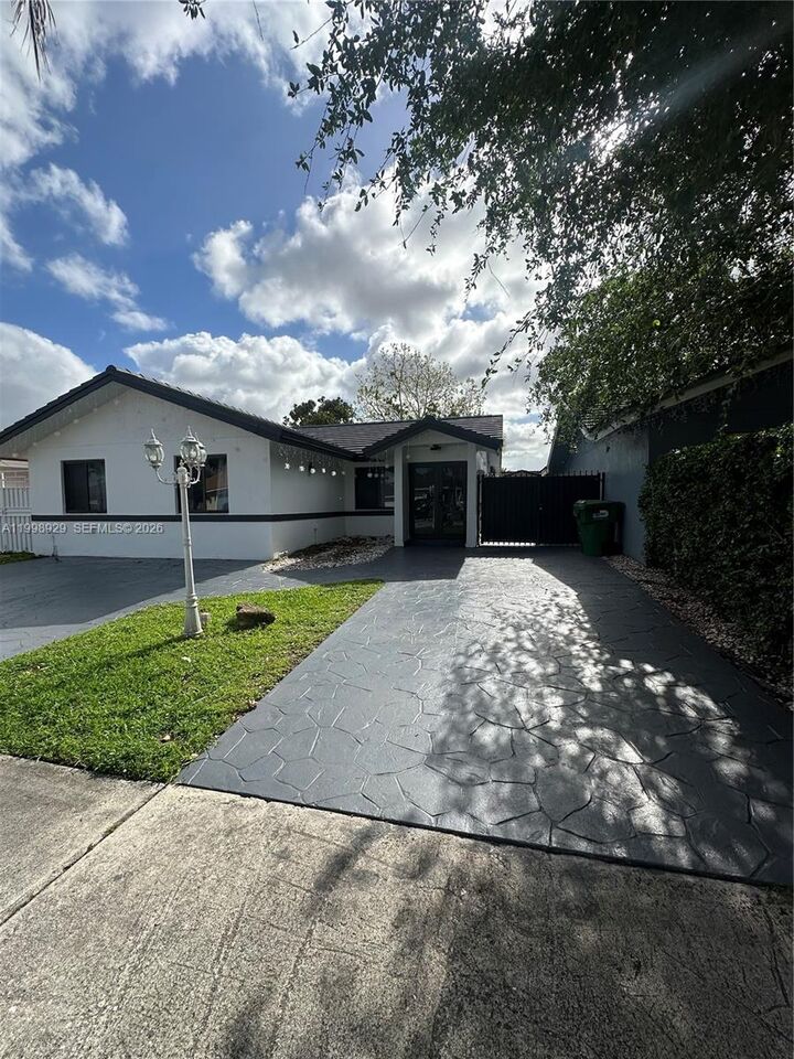 Property Photo:  5923 SW 147th Pl  FL 33193 