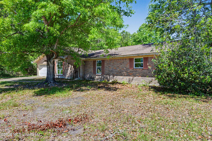 Property Photo:  1204 De La Pointe Drive  MS 39553 