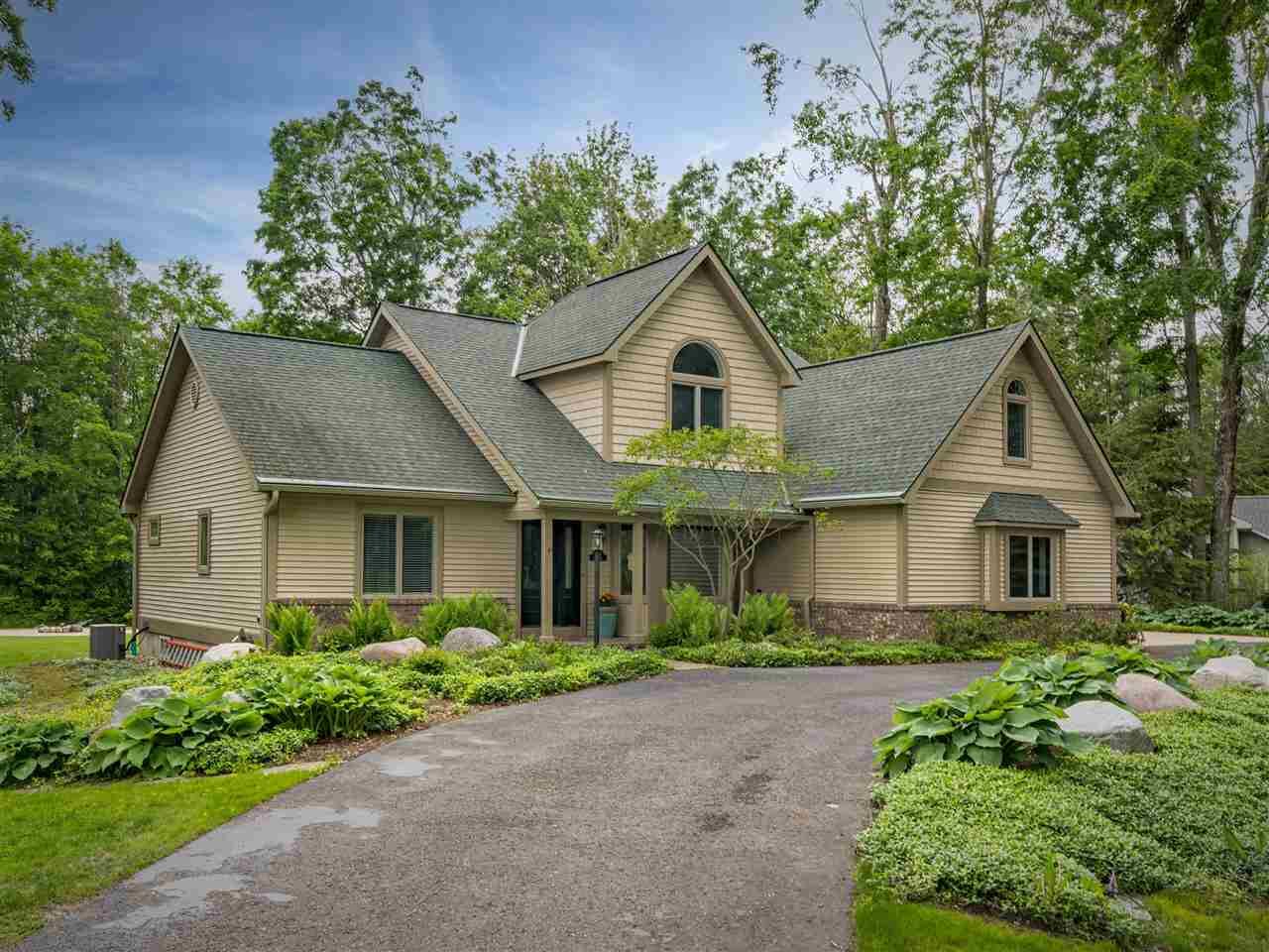 Property Photo:  6598 Forest Way  MI 49740 