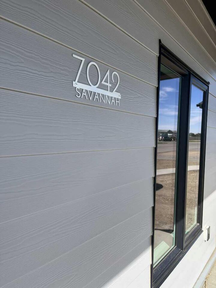 Property Photo:  7042 48 Street  AB T1G 0G7 
