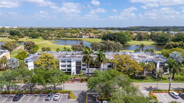 Property Photo:  16251 Golf Club Rd 311  FL 33326 