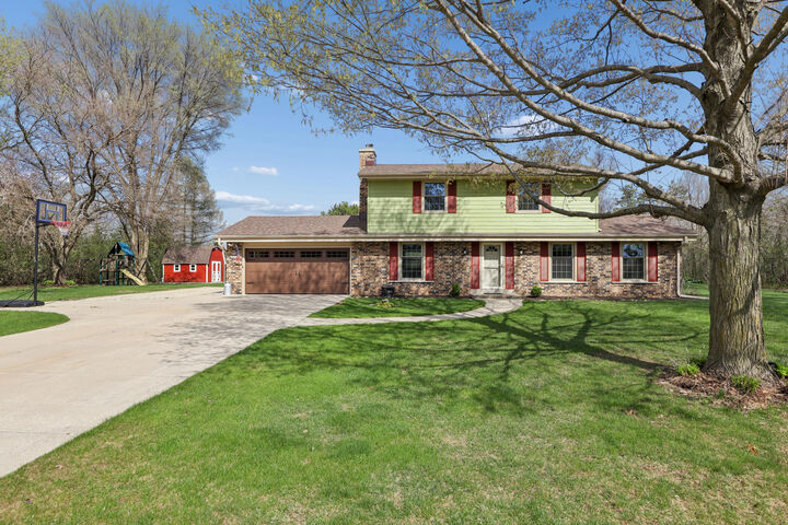 Property Photo:  W310s9014 Cherokee Pass  WI 53149 