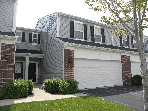 Property Photo:  206 Barrett Drive C  IL 60560 