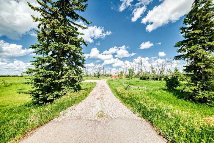 Property Photo: 225074 Highway 561 AB T1P 2C1