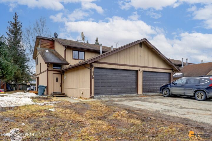 Property Photo:  1100 W 77th Avenue  AK 99518 