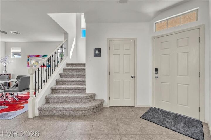 Property Photo:  1612 Yellow Tulip Place  NV 89012 