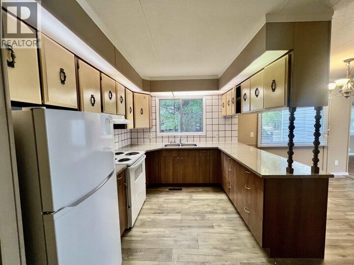 Property Photo:  4619 Lowrie Avenue 33  BC V8G 3X5 