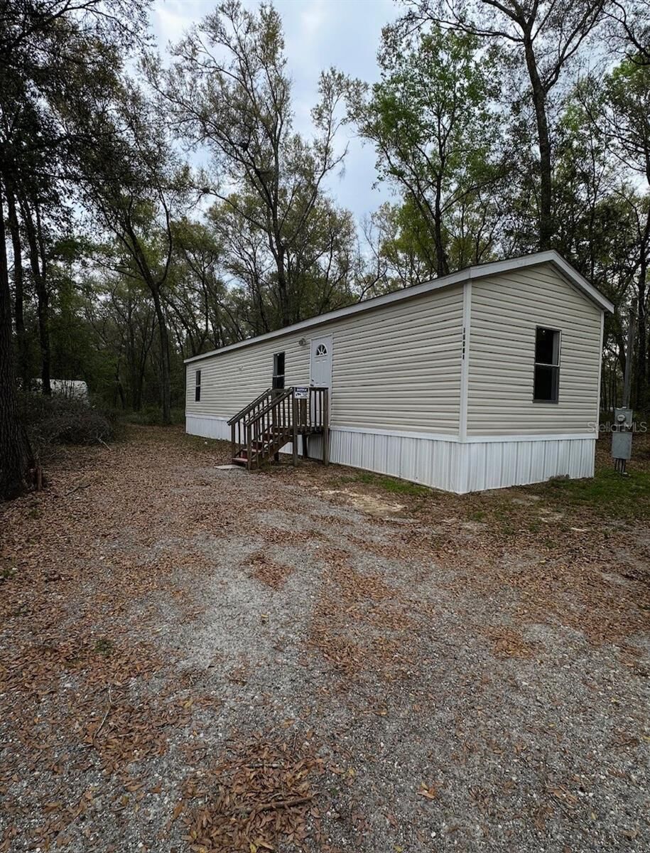 Property Photo:  10871 NE 106th Court  FL 32618 