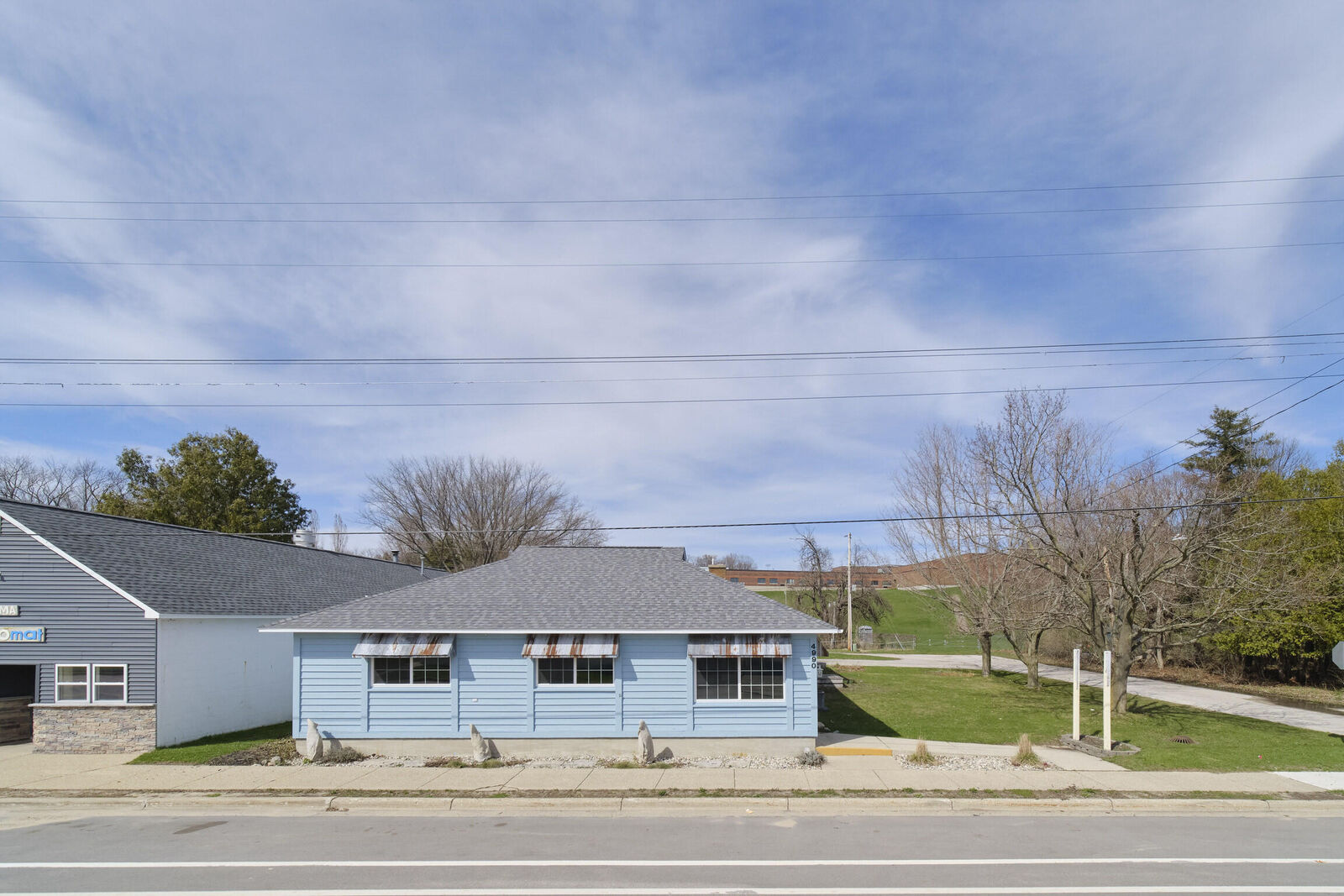 Property Photo:  4990 Main Street  MI 49675 