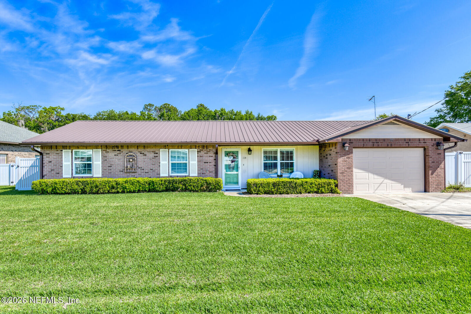 Property Photo:  114 Magnolia Drive  FL 32131 