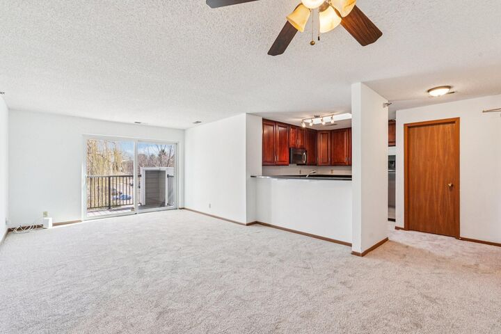 Property Photo:  6145 Chasewood Parkway 202  MN 55343 