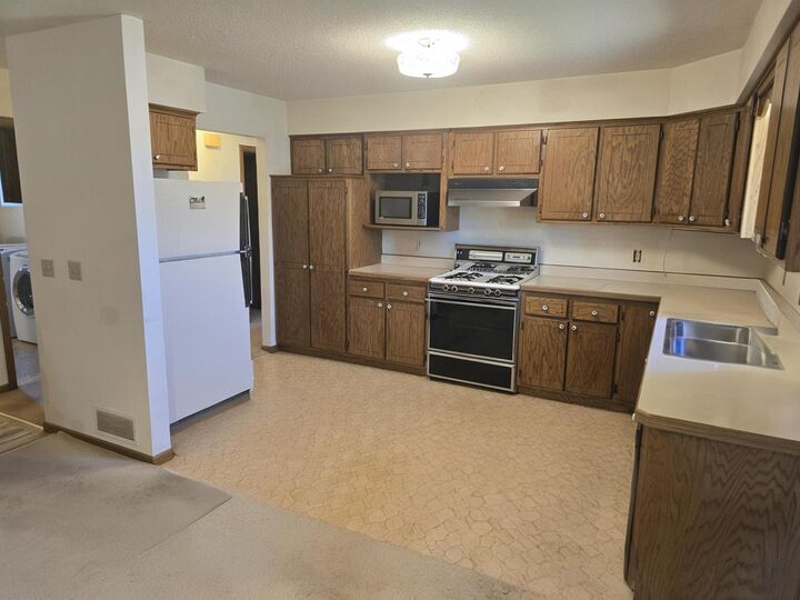 Property Photo:  1325 Karth Lake Circle  MN 55112 