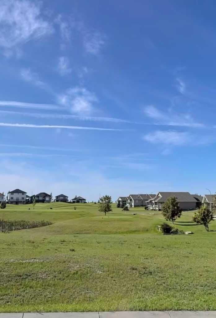Property Photo: 709 Whispering Greens Avenue AB T0L 2B0