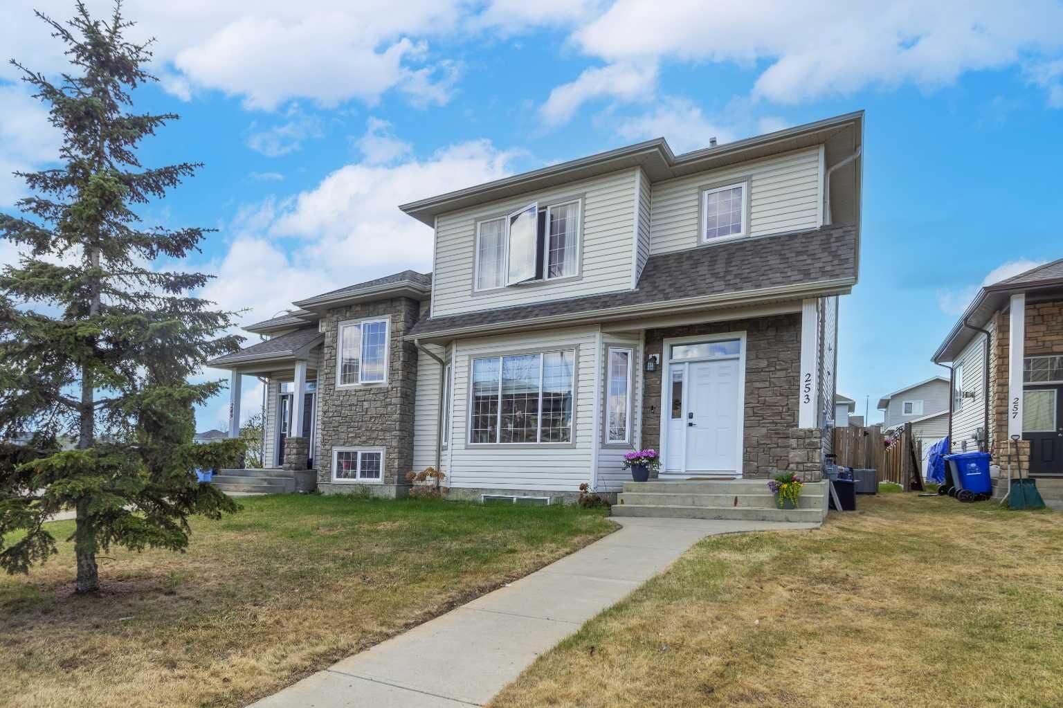 Property Photo: 253 Grosbeak Way AB T9K 0L8