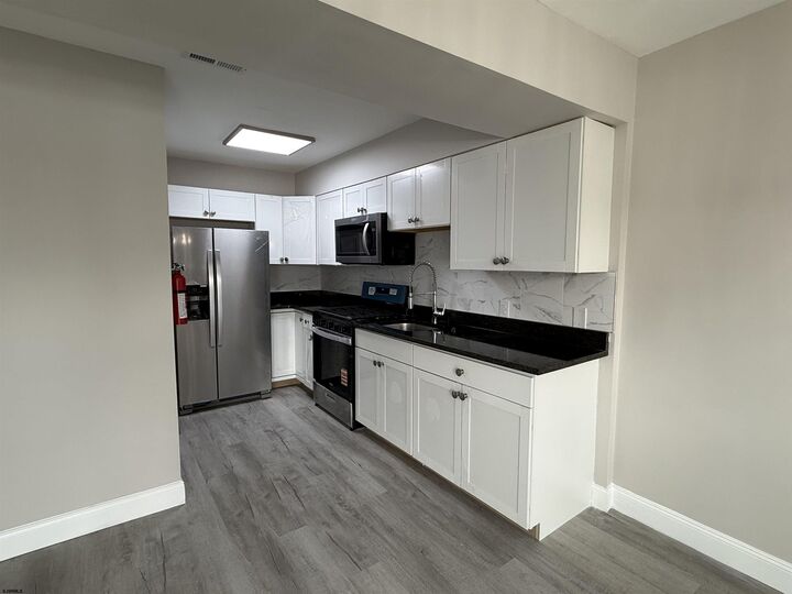 Property Photo:  1964 E Oak Road G-2  NJ 08361 