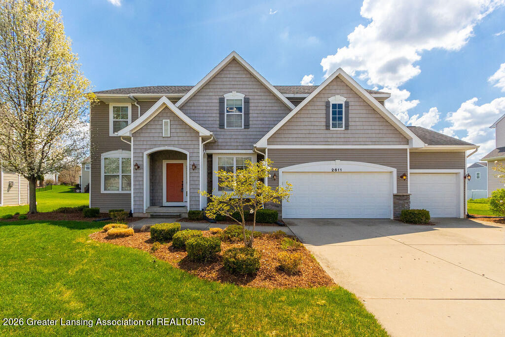 Property Photo:  2611 Lupine Drive  MI 48864 