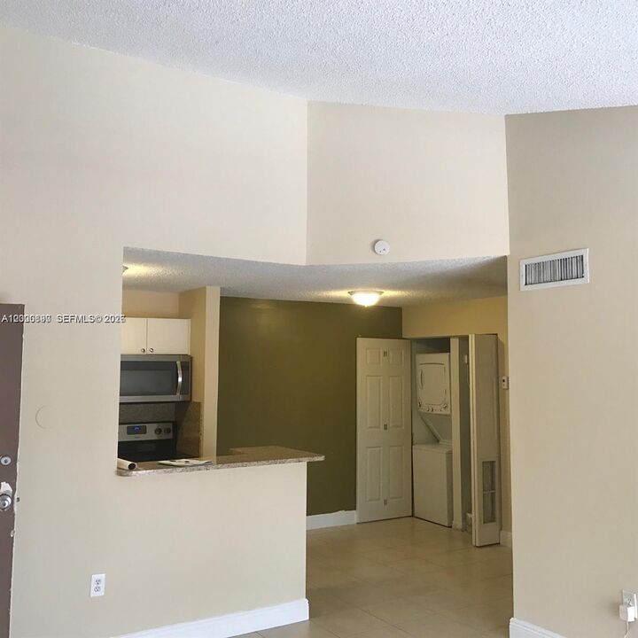 Property Photo:  7200 NW 179th St 302  FL 33015 