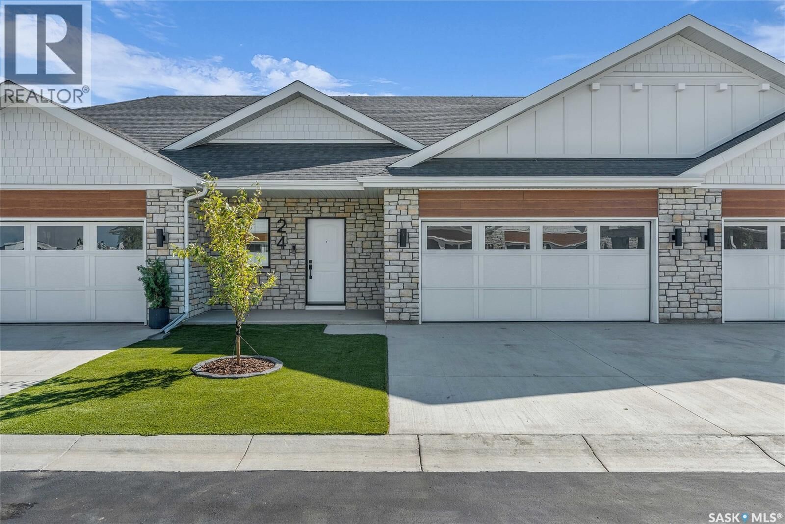Property Photo:  4 720 Brighton Boulevard  SK S7V 1X1 