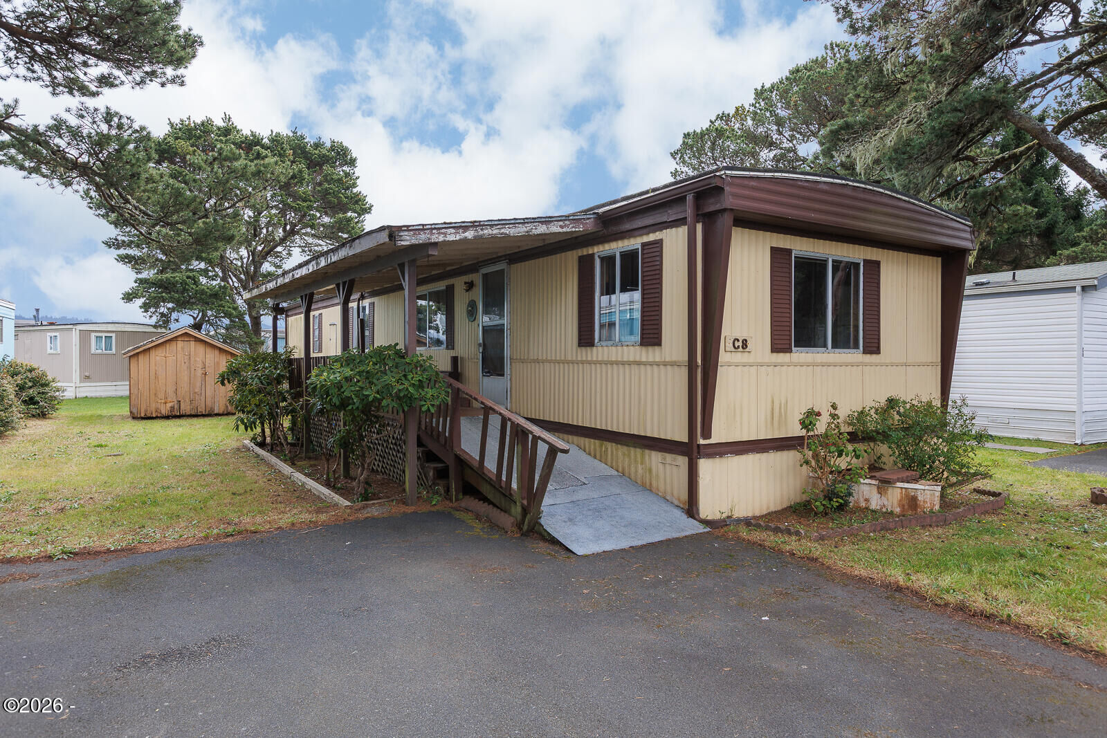 Property Photo:  955 NE Mill Street C8  OR 97394 