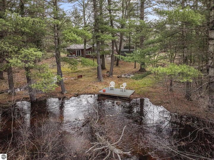 Property Photo:  9890 SE Angel Road  MI 49633 
