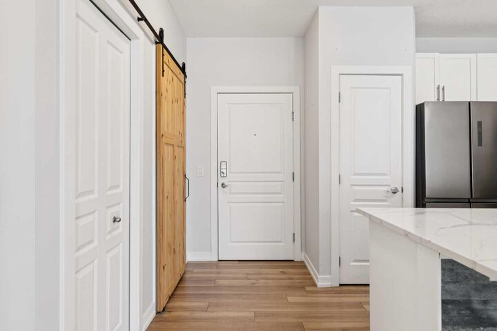 Property Photo:  10 Panatella Road NW 112  AB T3K 0V4 