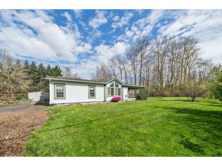 Property Photo:  609 NE South Shore Rd  OR 97211 