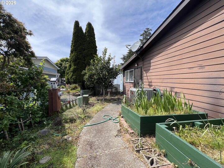 Property Photo:  16063 Driftwood Ln 10  OR 97415 