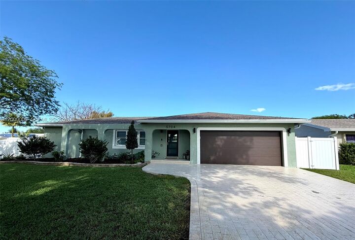 Property Photo:  5704 SW 116th Ave  FL 33330 