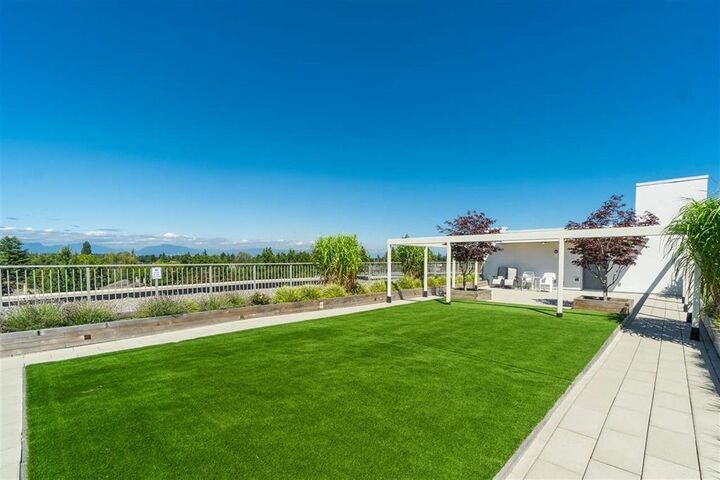 Property Photo: 4815 55B Street 105 BC V4K 3V7
