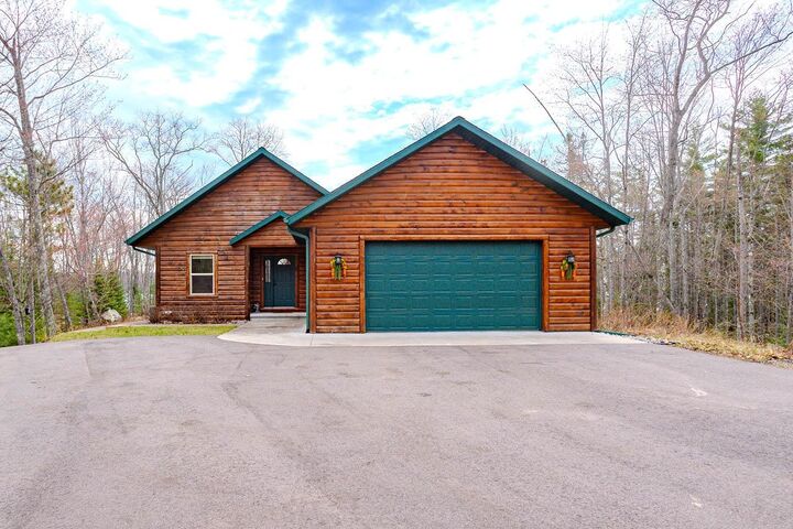 Property Photo:  4387 Double Oaks Tr  WI 54501 
