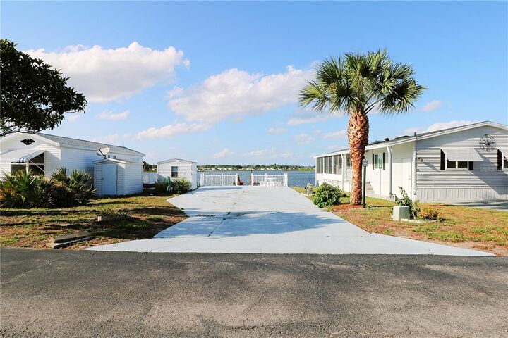 Property Photo:  7205 Windsong Drive  FL 33898 