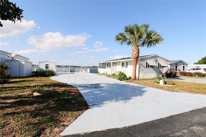 Property Photo:  7205 Windsong Drive  FL 33898 