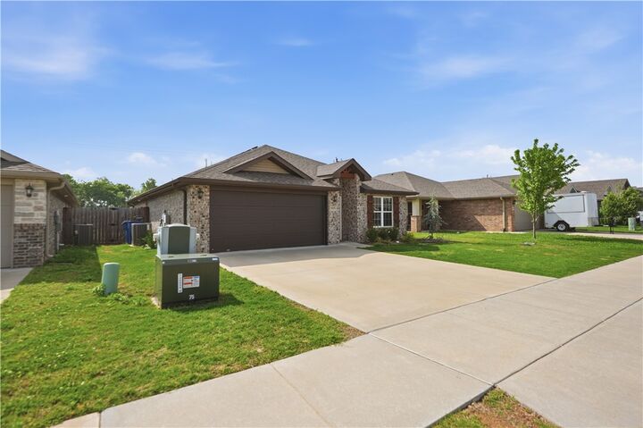 Property Photo:  5905 NW McClellen Street  AR 72713 