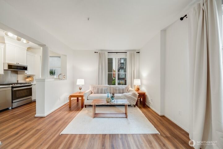 Property Photo:  10042  Main Street 203  WA 98004 