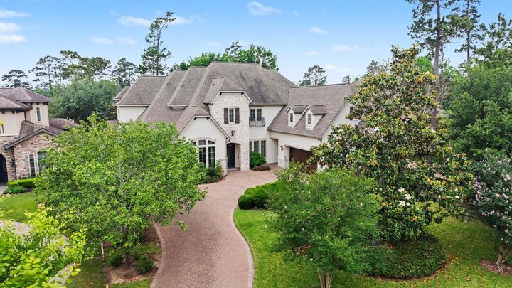 Property Photo:  3 Player Ridge Court  TX 77382 