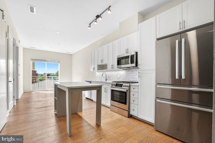 Property Photo:  6803 Cameron Drive NW 314  DC 20012 