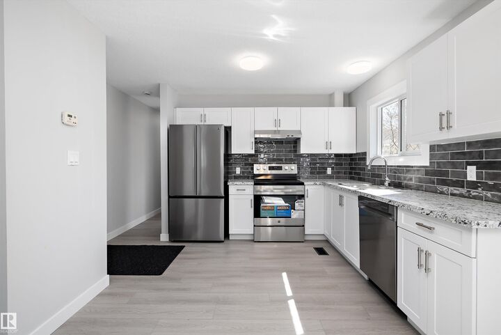 Property Photo:  44 Rim Road NW  AB T6P 1G7 
