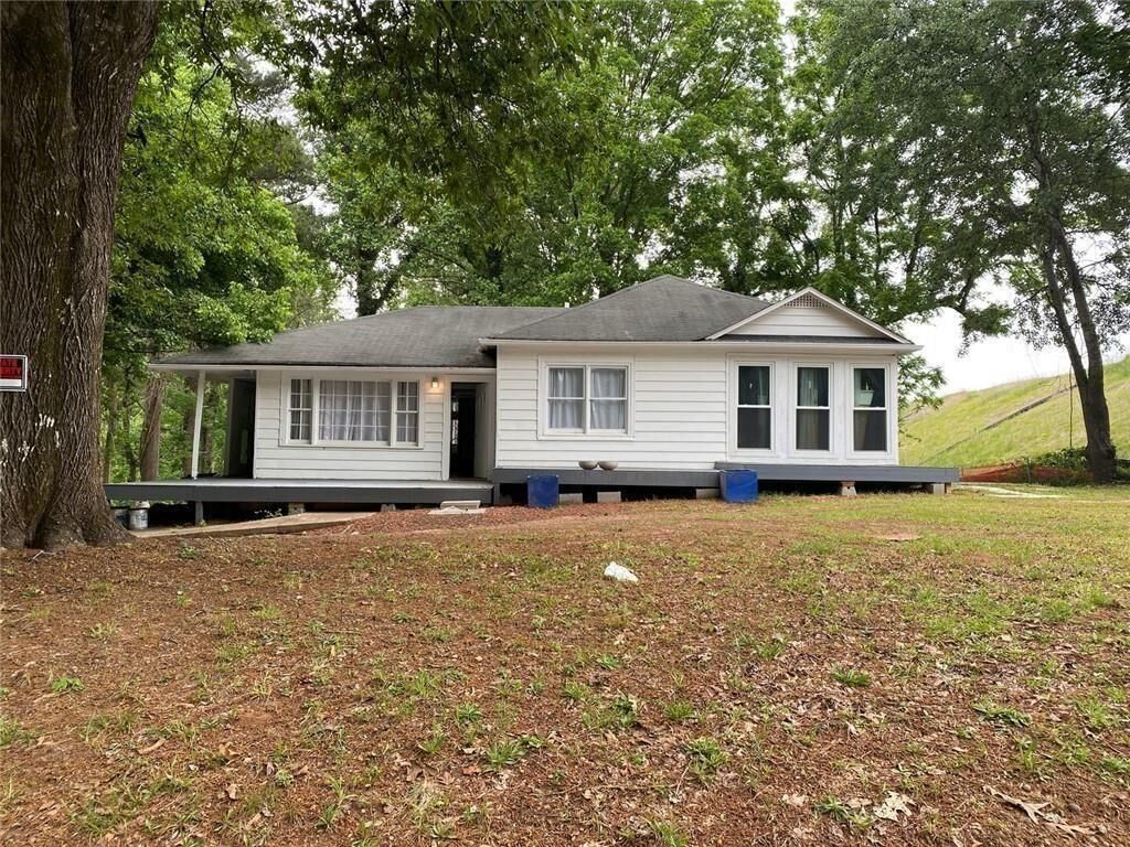 Property Photo: 4682 Stonewall Tell Road GA 30349