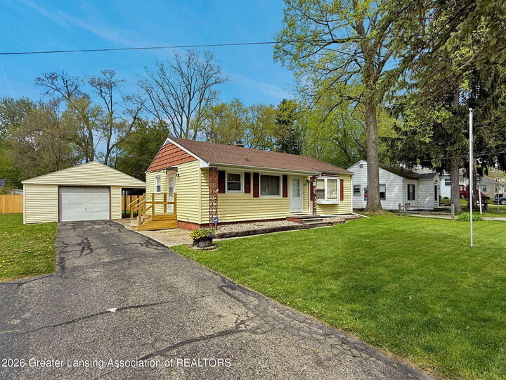 Property Photo:  6062 Valencia Boulevard  MI 48911 