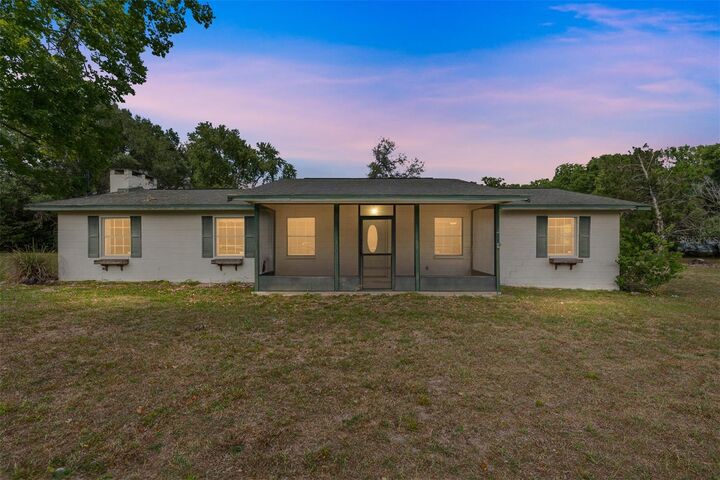 Property Photo:  415 SE Adams Street  FL 32643 