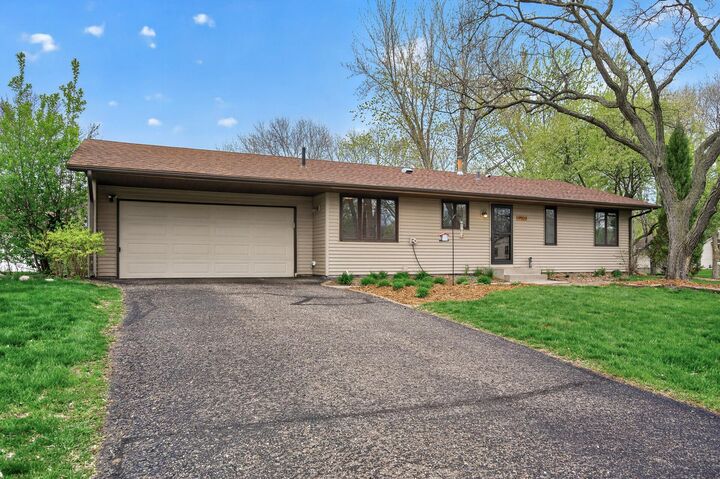 Property Photo:  9904 107th Place N  MN 55369 