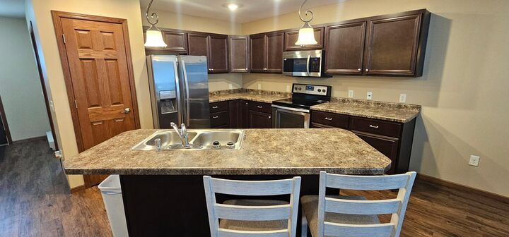 Property Photo:  1615 30th Street NW 24  MN 56601 