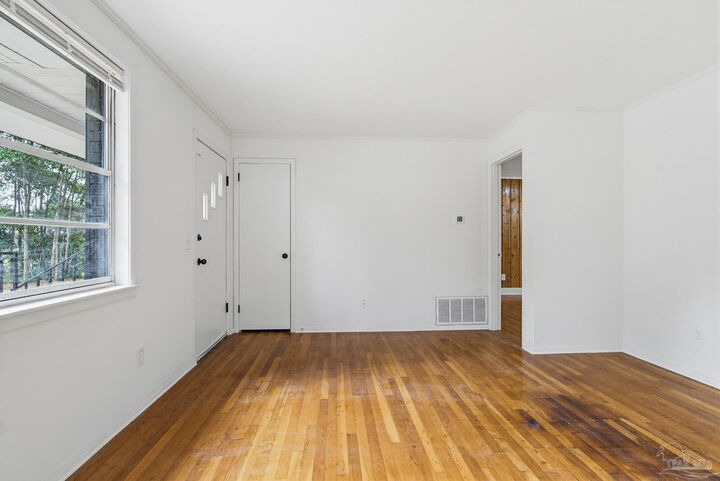 Property Photo:  909 N 74th Ave  FL 32506 