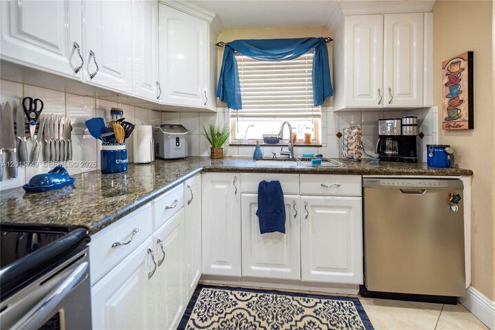 Property Photo:  9491 Evergreen Pl 302  FL 33324 