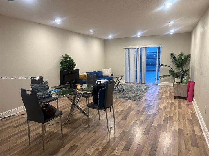 Property Photo:  879 NE 195th St 425  FL 33179 