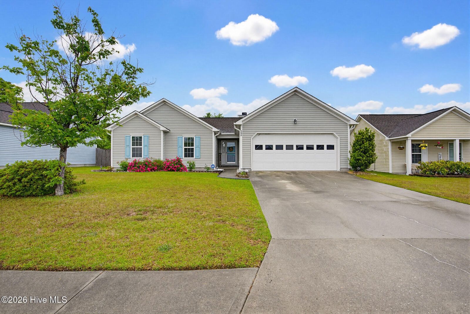 Property Photo:  208 Red Carnation Drive  NC 28445 