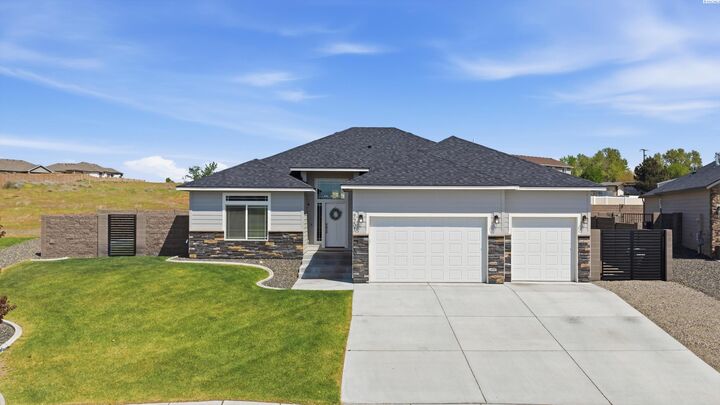Property Photo:  7207 Cornflower Dr  WA 99301 