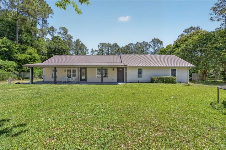 Property Photo:  6165 Garden City Road  FL 32539 